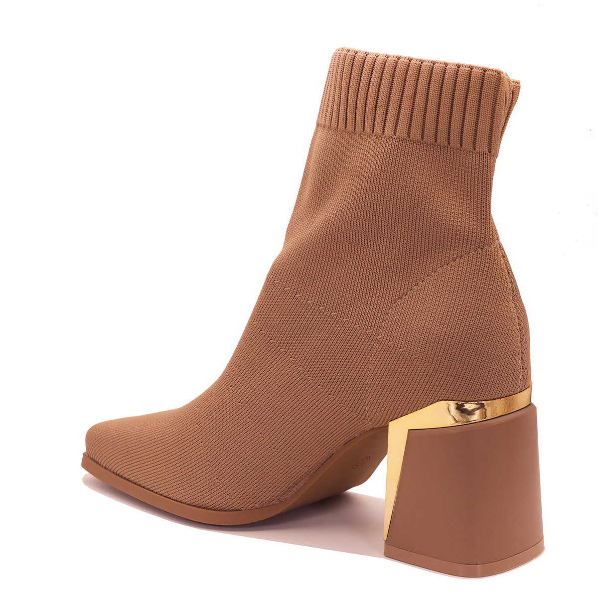 Bottes à semelle compensée et fermeture latérale